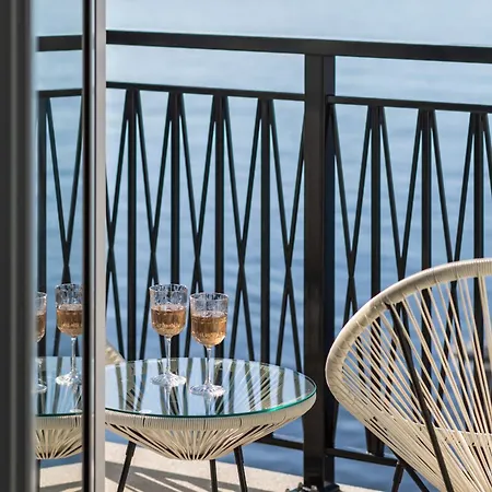 Bulwar Zachodzącego Słońca Z Widokiem Na Morze By Renters *